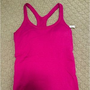 Lulu lemon ebb to street Tanktop, dark pink, size 6. Built in bra